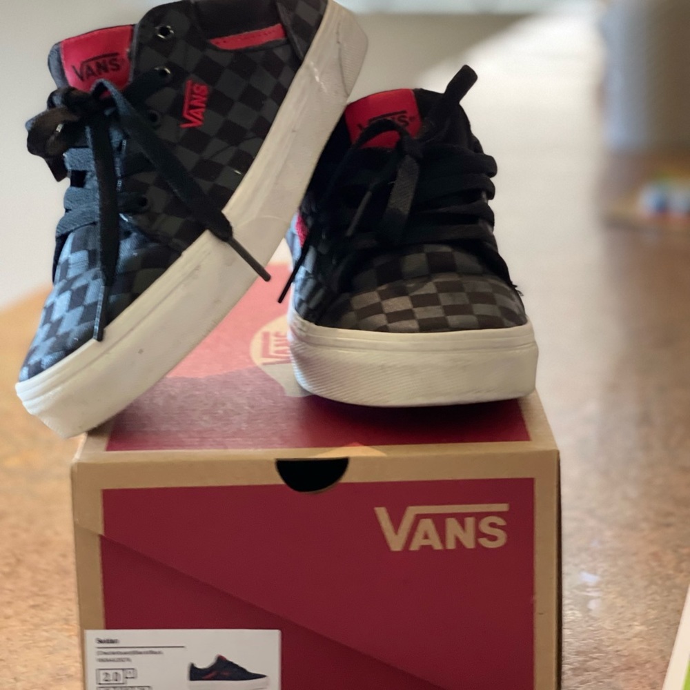 Boys size 2.0Y Vans. They are checkerboard black/black.